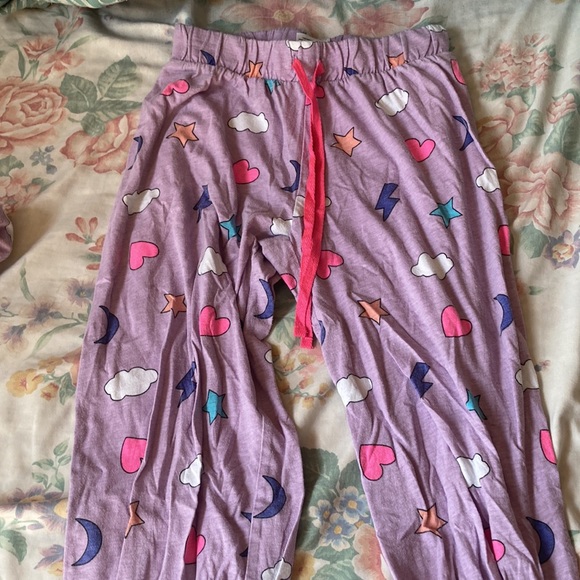 The brand is Joe Boxer, the size is Small, and the colors are purple etc. - Picture 2 of 2
